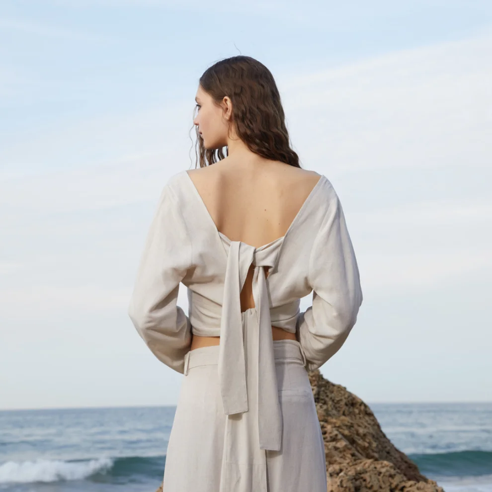 WE OFFICIAL - Linen Wrap Top